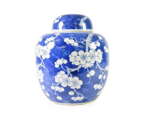 A Chinese Porcelain Jar and Cover, Kangxi reign mark but not of the period, of ovoid form, painted in underglaze blue with th