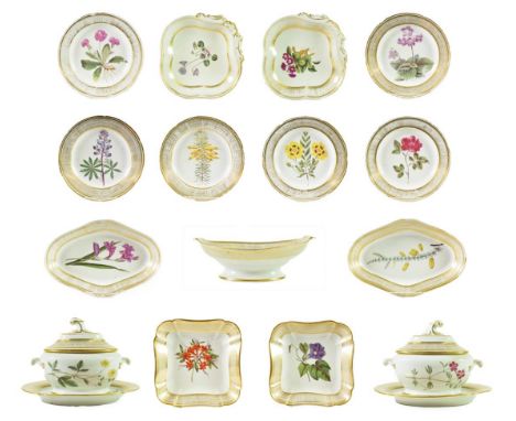 A Coalport Porcelain Botanical Dessert Service, circa 1810, painted with named botanical specimens within gilt borders, title