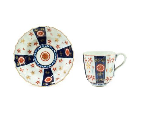 A Worcester Porcelain Large Coffee Cup and Saucer, circa 1770, of fluted form, painted with the Queen's Japan Star pattern, s