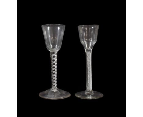 A Wine Glass, circa 1750, the rounded funnel bowl on an air twist stem and circular foot, 16cm high; and A Similar Cordial Gl