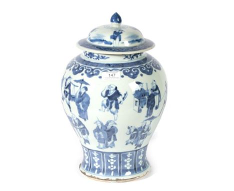 A Chinese Porcelain Baluster Jar and Cover, Kangxi reign mark and possibly of the period, painted in underglaze blue with fig