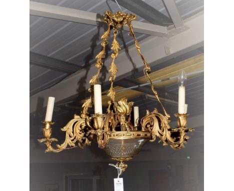 A Gilt Metal Six-Light Chandelier, 19th century, with leaf cast boss and chains, cut glass bowl and leaf sheathed scroll bran