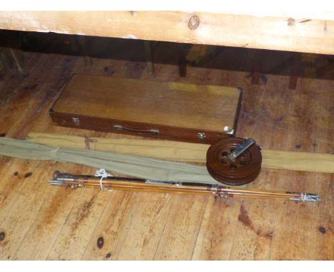 Three vintage fishing rods, Scarborough oak reel and gun case