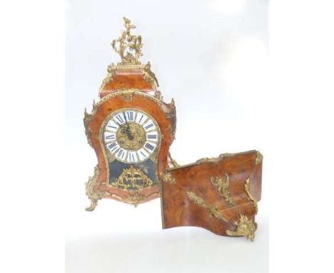 Walnut and Ormolu mounted bracket clock with bracket having enamel painted Roman numerals and German movement