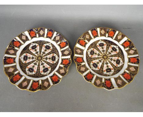 Royal Crown Derby - a pair of Royal Crown Derby cabinet plates decorated in the Imari palette, 1128 pattern dinner plates, co