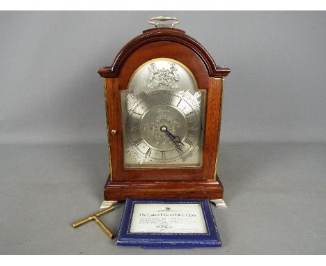 A limited edition Garrard &amp; Co 'Silver Jubilee' mantel clock, the three train movement engraved 'Specially Commissioned B