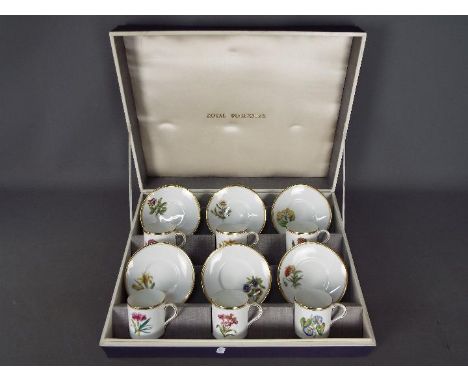 Royal Worcester - A cased Royal Worcester coffee service comprising six saucers and six coffee cans, each decorated with diff