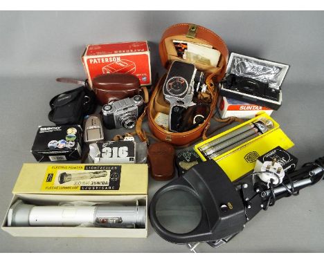 Photography - A quantity of cameras and accessories to include a Zeiss Ikon Contina, Olympus, Bolex cine camera and a Luxo ma