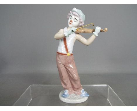 Lladro - A Lladro figurine from the Utopia Collection entitled 'Bohemian Melodies' # 8239, depicting a clown playing the viol