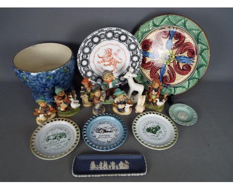 A mixed lot of ceramics to include Hummel and Hummel style figurines, a Midwinter Larry the Lamb figure, Royal Winton jardini