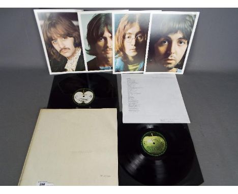 The Beatles, White Album, Stereo PCS 7067 / 7068, Number 0202494. Condition of vinyl appears excellent, light surface marks o