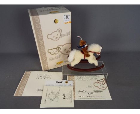 Steiff -  a Steiff Teddy Bear with Rocking Horse, # 037337 issued in a Limited Edition. Steiff Teddy Bear with button and whi