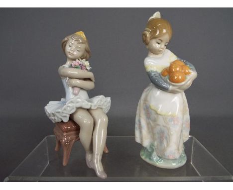 Lladro - Two Lladro figurines comprising 'First Performance' # 6763 and 'Valencian Girl' # 4841, largest approximately 17 cm 