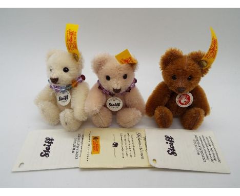 Steiff - a brown mohair Steiff bear with jointed limbs, stitched nose, tag, button and yellow label in ear, 8.5 cm (h) tag/bo