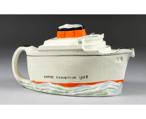 A Midwinter Pottery 1938 Empire Exhibition Teapot and Cover, modelled as a three funnelled liner, inscribed "Empire Exhibitio