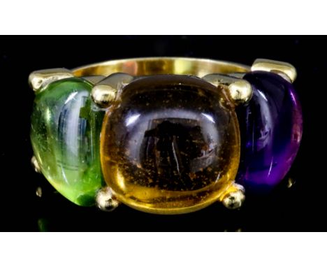 A Citrine, Peridot and Amethyst Ring, Modern, in 18ct gold mount, set with three cabochon stones, approximate total weight of