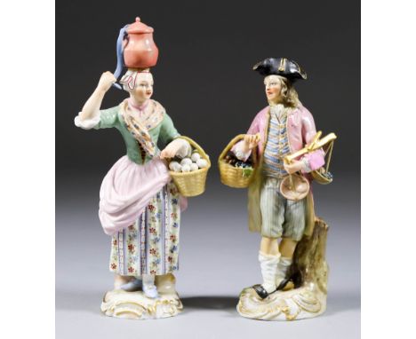 A Pair of Meissen Porcelain Figures, 20th Century, of street vendors, 5.5ins and 6.25ins high (blue crossed swords mark and i