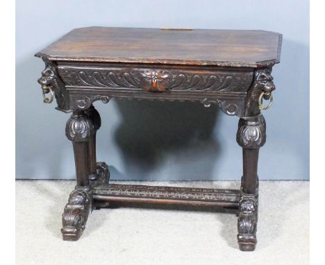 A Carved "Black Oak" Octagonal Centre Table, 19th Century, with carved edge to top and gadroon carved frieze, the corners wit