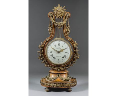 A French Burrwood and Gilt Metal Mounted Lyre Mantel Timepiece, Late 19th Century, the 5ins diameter domed enamel dial signed