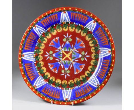 A Continental Circular Porcelain Charger, Late 19th Century, by J. Coulon, painted in enamel colours, the centre with stylise