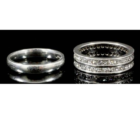 A Diamond Two Band Full Hoop Eternity Ring, Modern, in platinum mount, size K, and a wedding band, platinum, size K, gross we