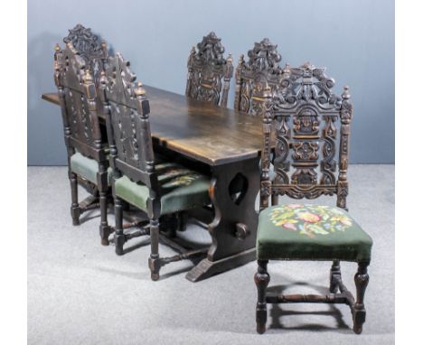 An Oak Refectory Table, 20th Century, of "17th Century" design, with plain top on shaped and fretted end supports with trestl