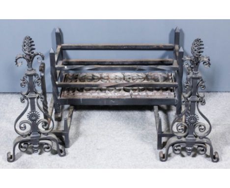 A Wrought Iron Fire Grate and a Pair of Andirons, the grate with spiral twist front rails and uprights, 26.5ins wide x 13ins 