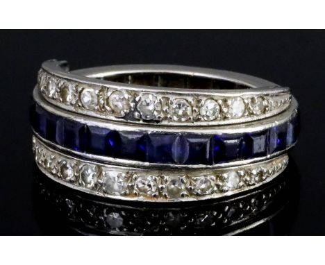 A Sapphire, Ruby and Diamond Full Eternity Ring, Modern, in silvery coloured metal mount, the central band set with sapphires