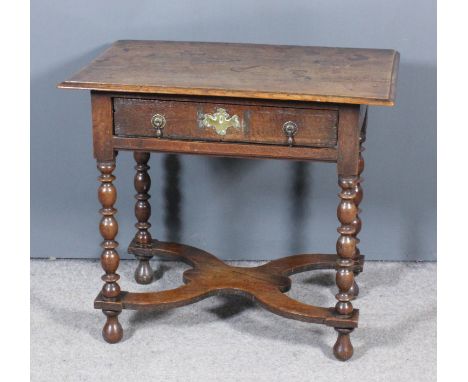 An Oak Side Table, Late 17th/Early 18th Century, with moulded edge to top, fitted one frieze drawer, on bobbin turned support