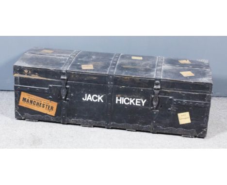 A Black Painted and Metal Bound Two-Handled Trunk, Early 20th Century, with slightly domed top and oxidised metal strap hinge