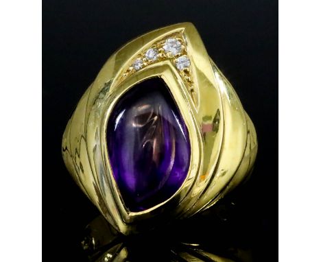 An Amethyst and Diamond Ring, Modern, in 18ct gold mount, set with a shaped cabochon amethyst, approximate weight 2ct, and fo