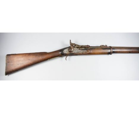 An 1873 .60 Calibre Snider Carbine, the 22ins plain steel barrel with elevating leaf sights stamped crown over BP, bright ste