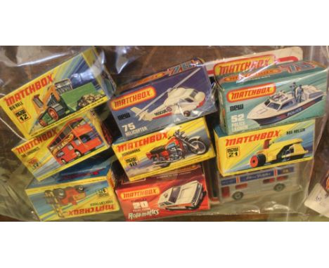 Eight "Matchbox" diecast vehicles, includes Big Bull 12, and numbers 15, 17, 18, 20, 21, 52, and 75 all in original boxes, to