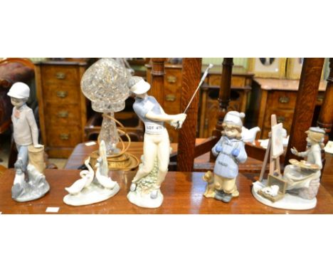 A Nao ceramic golfer, three other Nao figures and a Lladro artist (5)