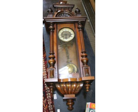 An early 20th century Vienna wall clock, the dial with Roman numerals