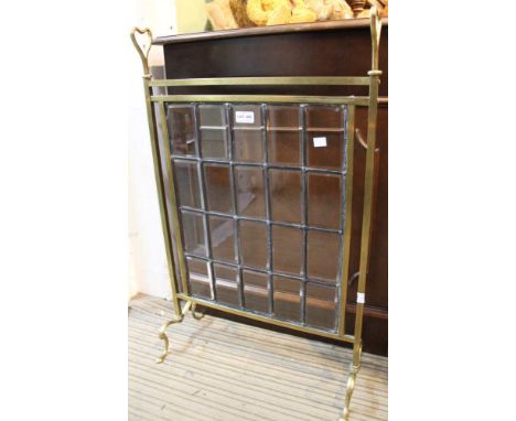 A 19th century art nouveau fire screen, having 20 inset bevelled glass panels