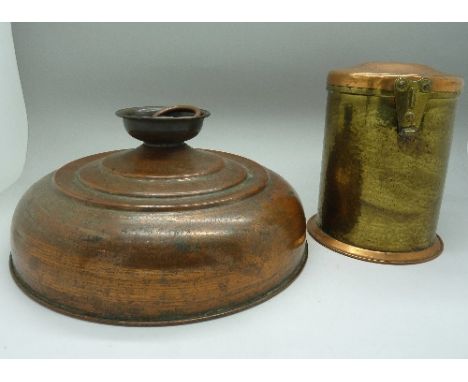 A copper bed warmer and a copper caddy with liner
