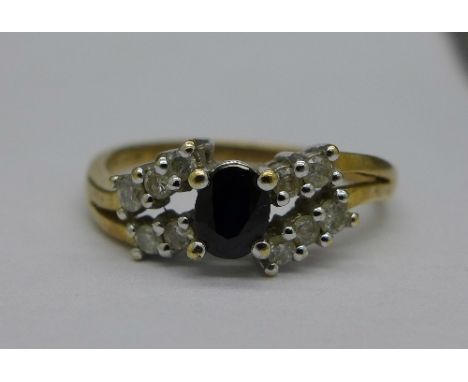 A 9ct gold, diamond and sapphire ring, weight 2.5g, size P