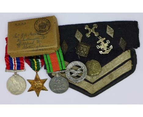 A World War II trio including The Pacific Star and various Boys Brigade badges and cloth patch