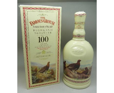 The Famous Grouse Finest Scotch Whisky Highland Decanter, to commemorate 100 years, sealed with contents, boxed