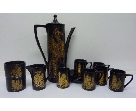 A Portmeirion Phoenix six setting coffee set lacking two saucers