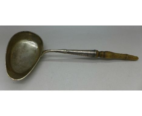 A 19th Century Swedish silver ladle, marked M4, for 1842