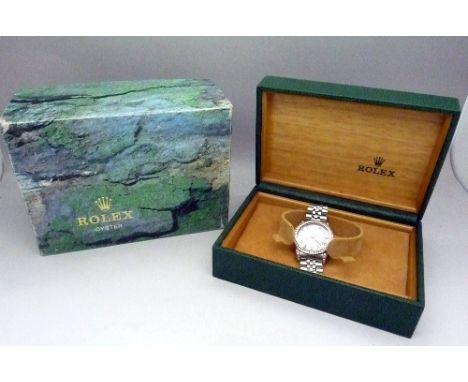 A lady's mid-sized Rolex Oyster Perpetual chronometer wristwatch, the pink mother of pearl dial hour markers set with diamond