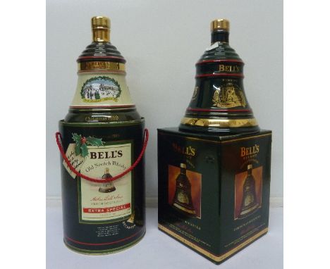 Two Bell's Scotch Whisky decanters, Christmas 1989 and 1993, sealed with contents, boxed