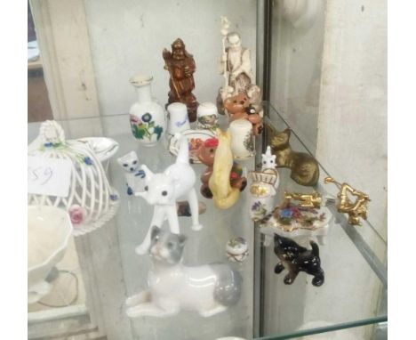 SHELF OF DECORATIVE CHINAWARE INCL; CHINA DISH IN SHAPE OF A TROWEL, LLADRO CAT DAMAGED &amp; OTHERS ETC