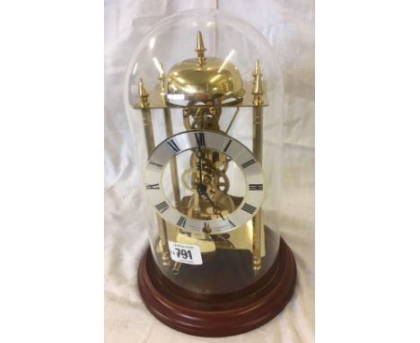 MODERN DOMED MANTEL CLOCK WITH VISIBLE BRASS MOVEMENT