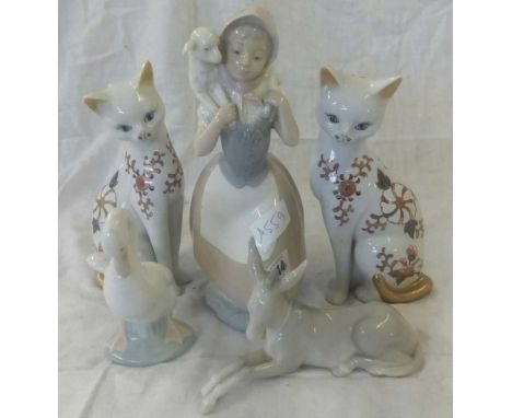 SHELF OF 5 CHINA PIECES, 2 MARKED NAO TO BASE, 1 A GIRL CARRYING A LAMB 2ND A SWAN, 3RD LLADRO OF A DONKEY IN LYING POSITION,