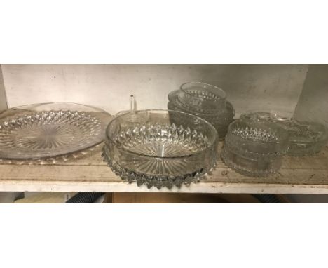 SHELF OF GLASS DISHES