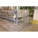 Container washer, capable of handling 4" wide x 5" tall containers, 6' long overall, with interior