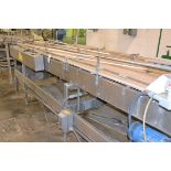 Stainless steel table top belt single filer with nine (9) belts, unit with (8) 4.5" plastic belts